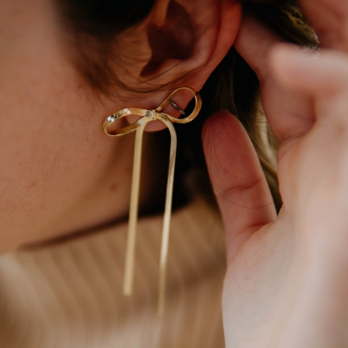 Long Bow Tassel Earrings - Band Earrings