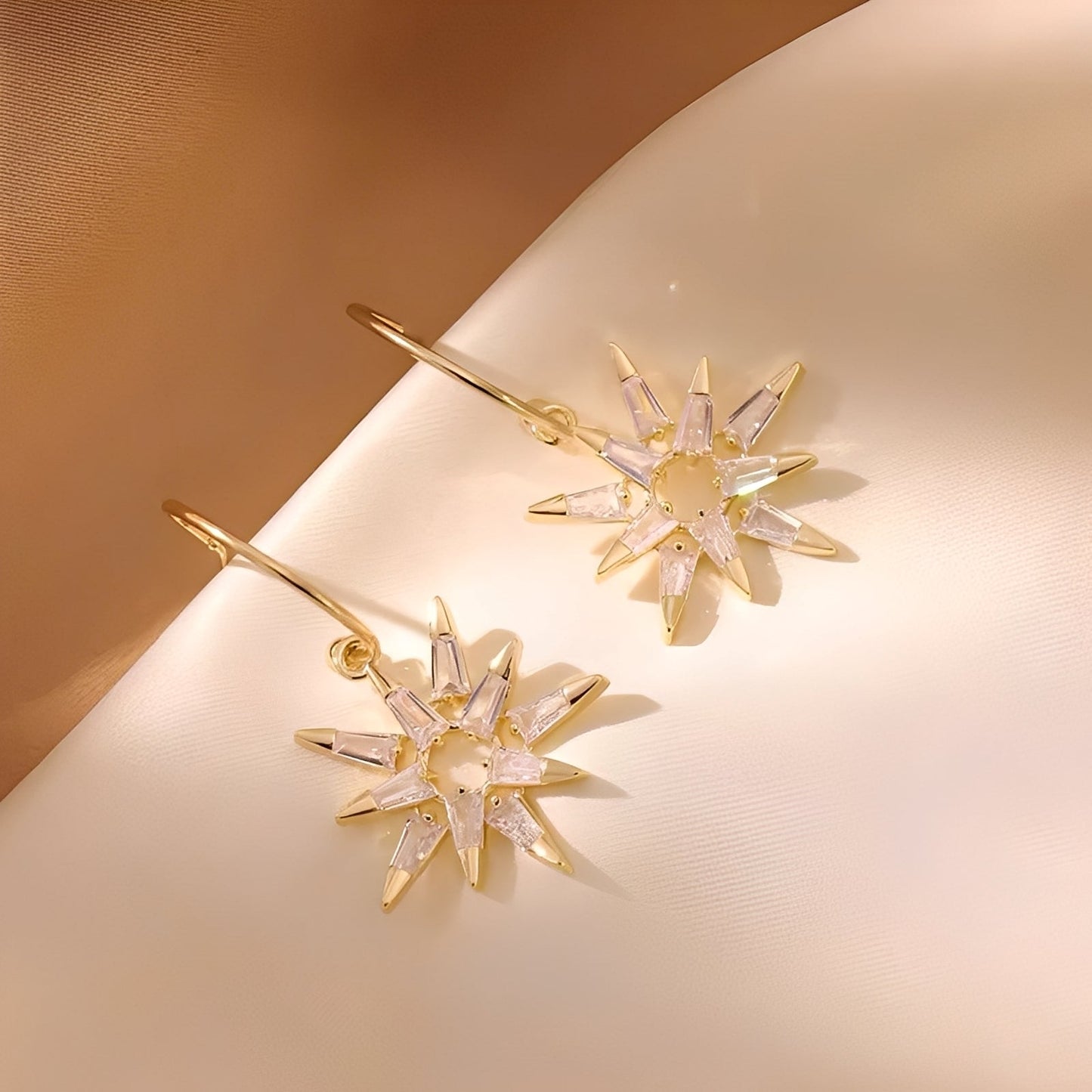 Xienna – Glittering golden star earrings