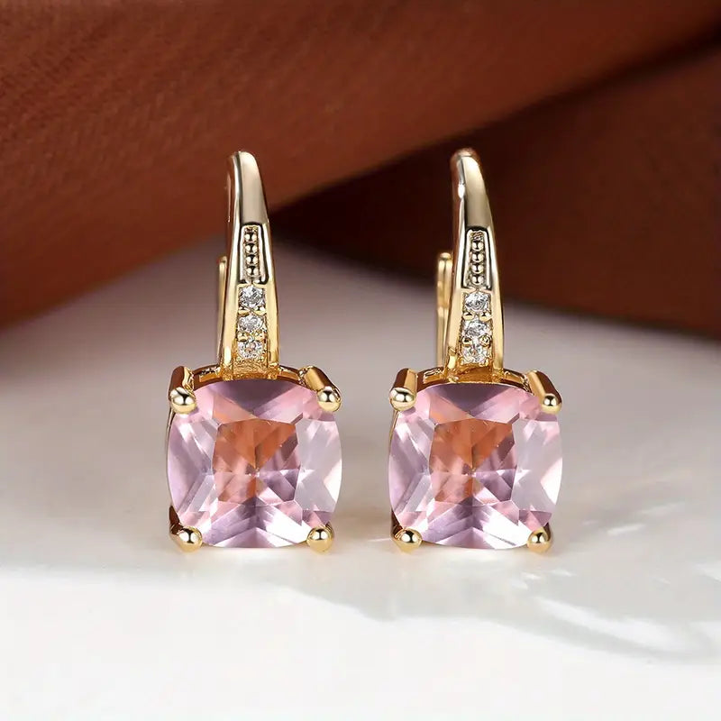 Claudine – Golden Hoop Earrings with Mystical Sapphire