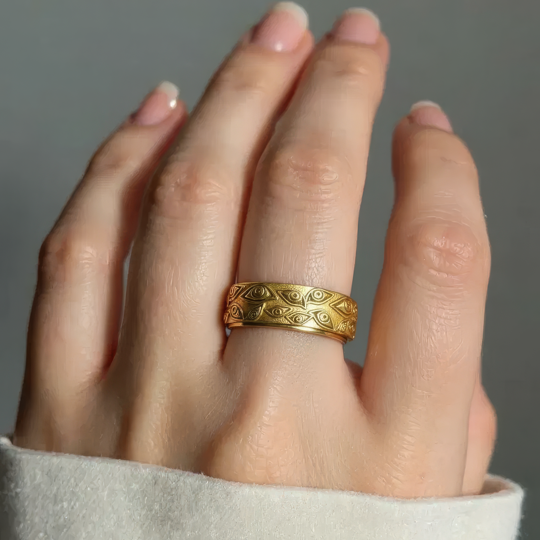 Women’s Wide Ring with Eye Motif and Rotatable Band