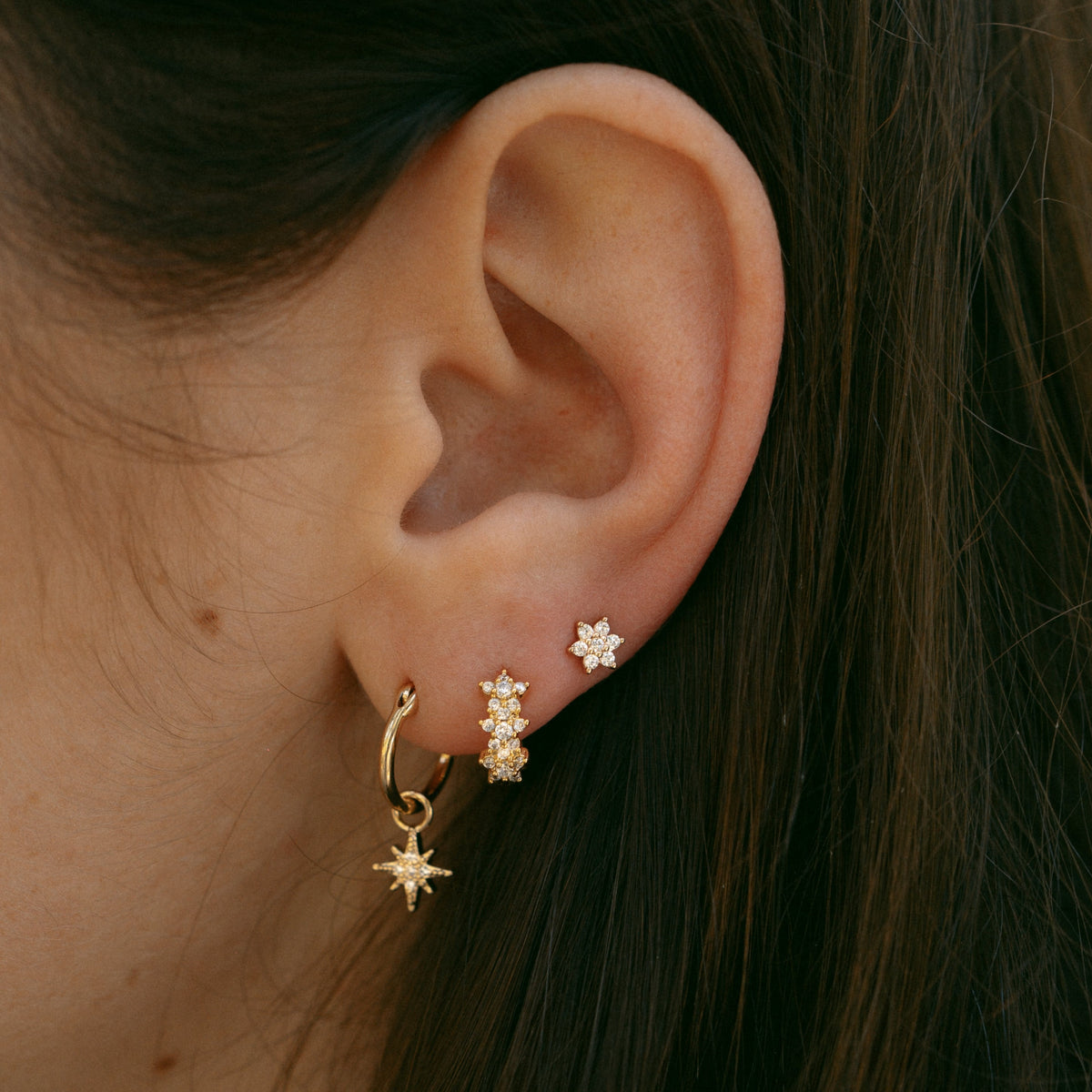 Women’s Huggie Earring with Floral Relief and Multi-Row Stone Setting