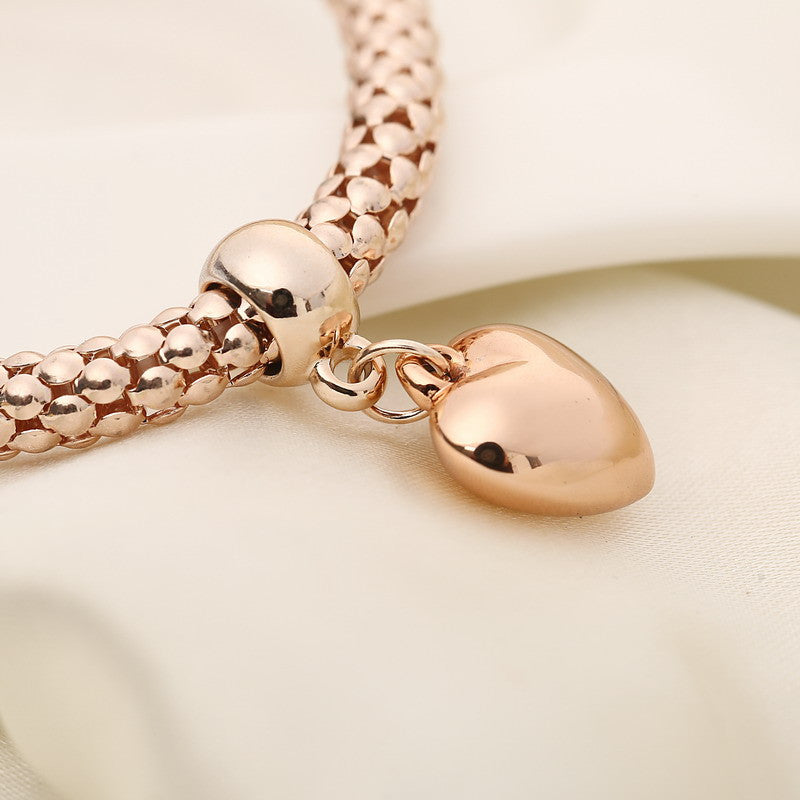 Aria – Metal bracelet with solid hearts