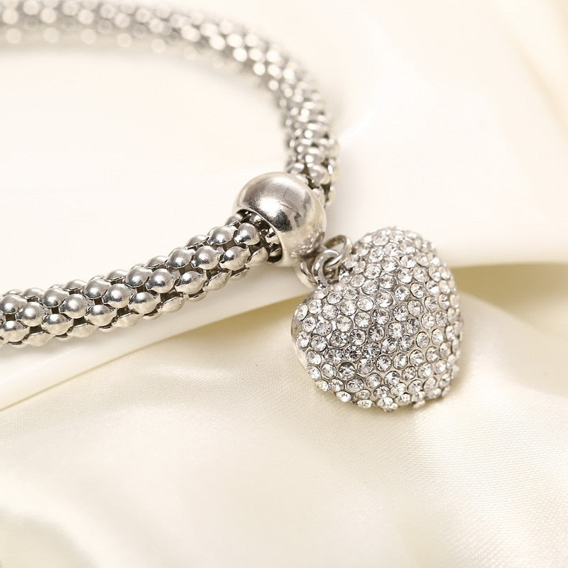 Aria – Metal bracelet with solid hearts