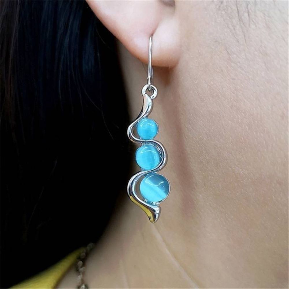 Women Drop Earrings with Elongated Pendant Design