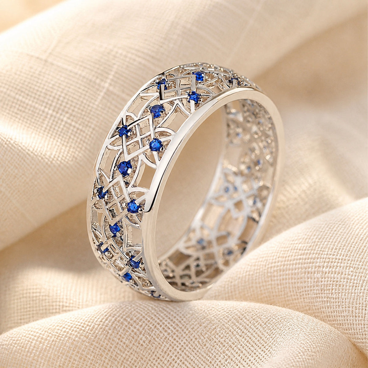 Women’s Filigree Ring with Oval Center Stone and Cut-Out Band Design
