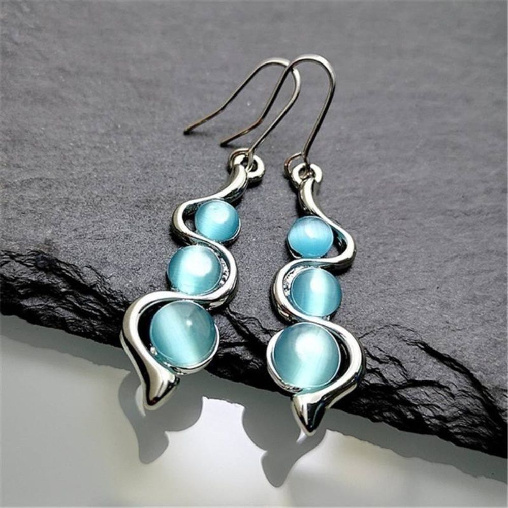 Women Drop Earrings with Elongated Pendant Design