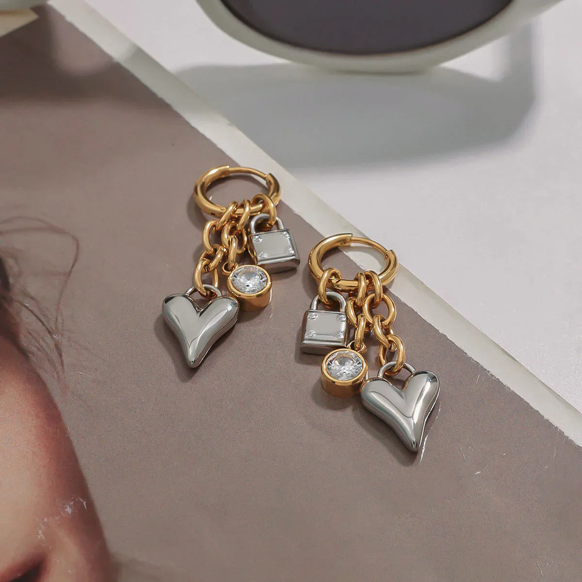 Women's Huggie Earrings with Heart Pendant, Lock Charm and Chain Details