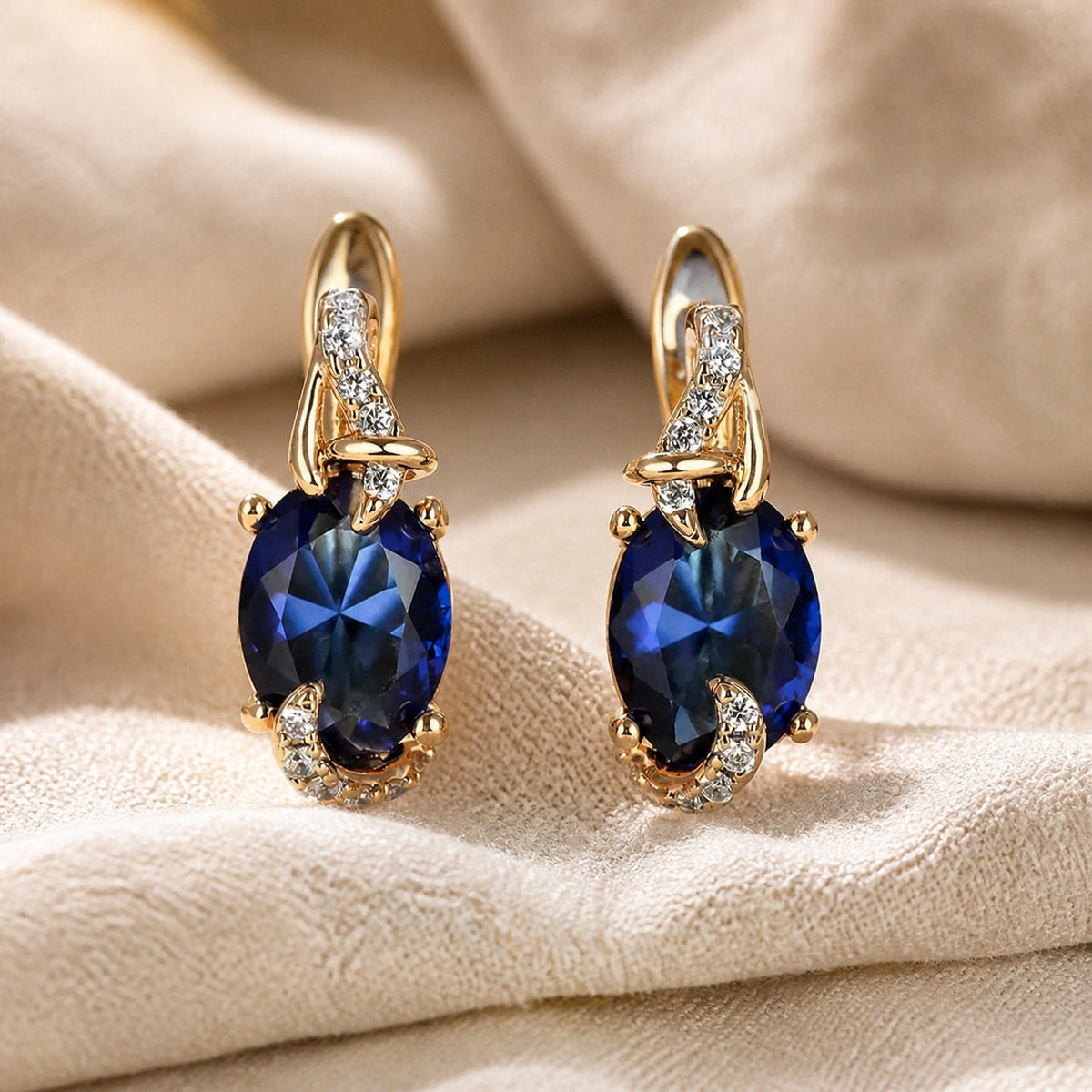 Women’s Drop Earrings with Oval Center Stone and Curved Frame