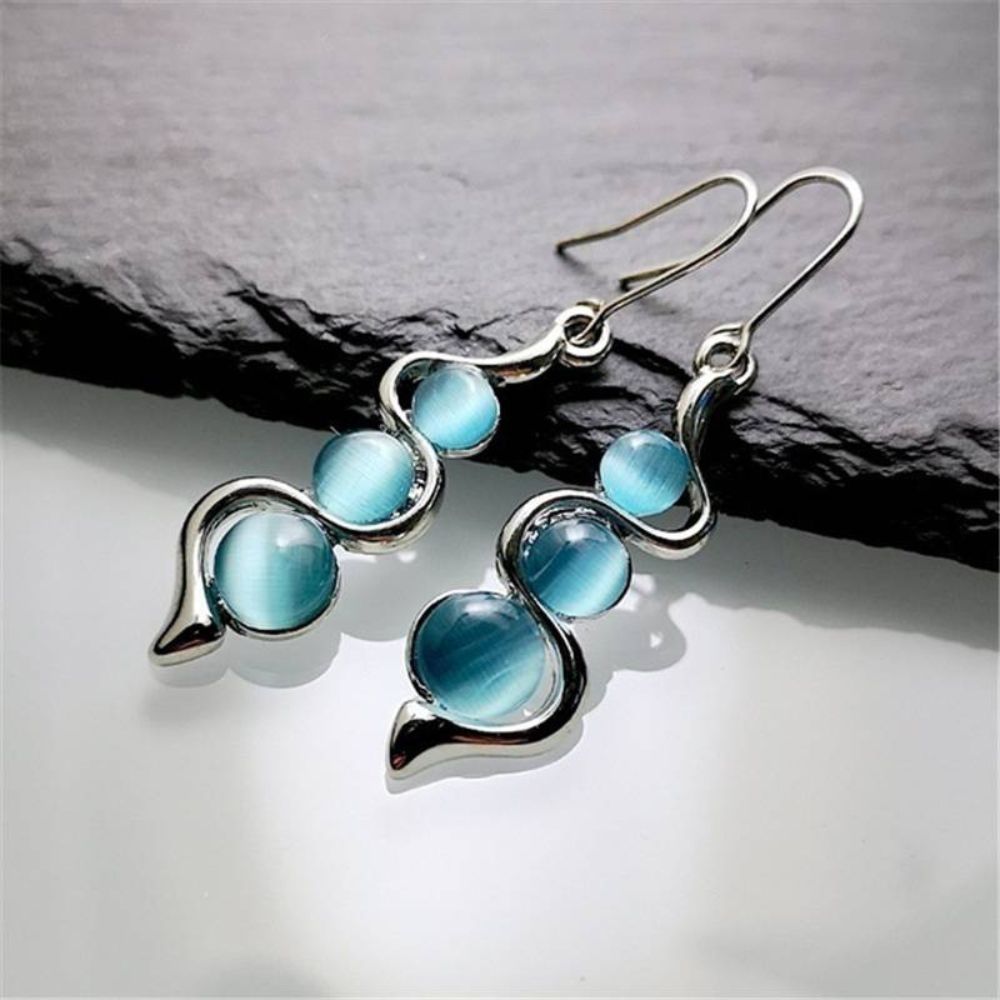 Women Drop Earrings with Elongated Pendant Design