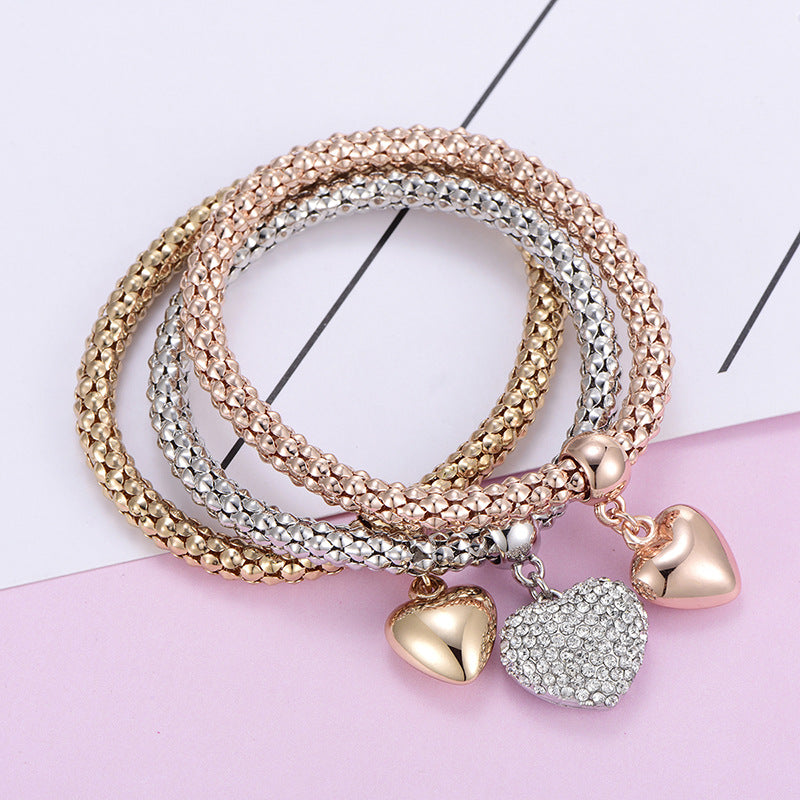 Aria – Metal bracelet with solid hearts