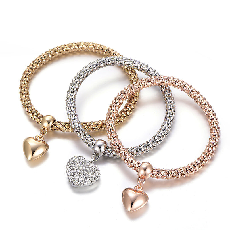 Aria – Metal bracelet with solid hearts