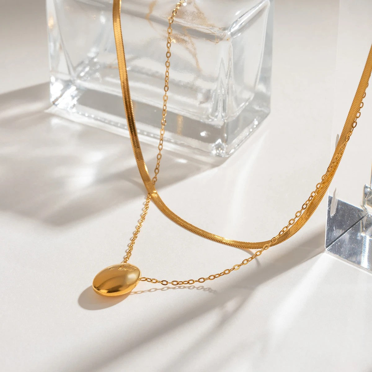 Women’s Layered Necklace with Oval Pendant and Two Different Chains