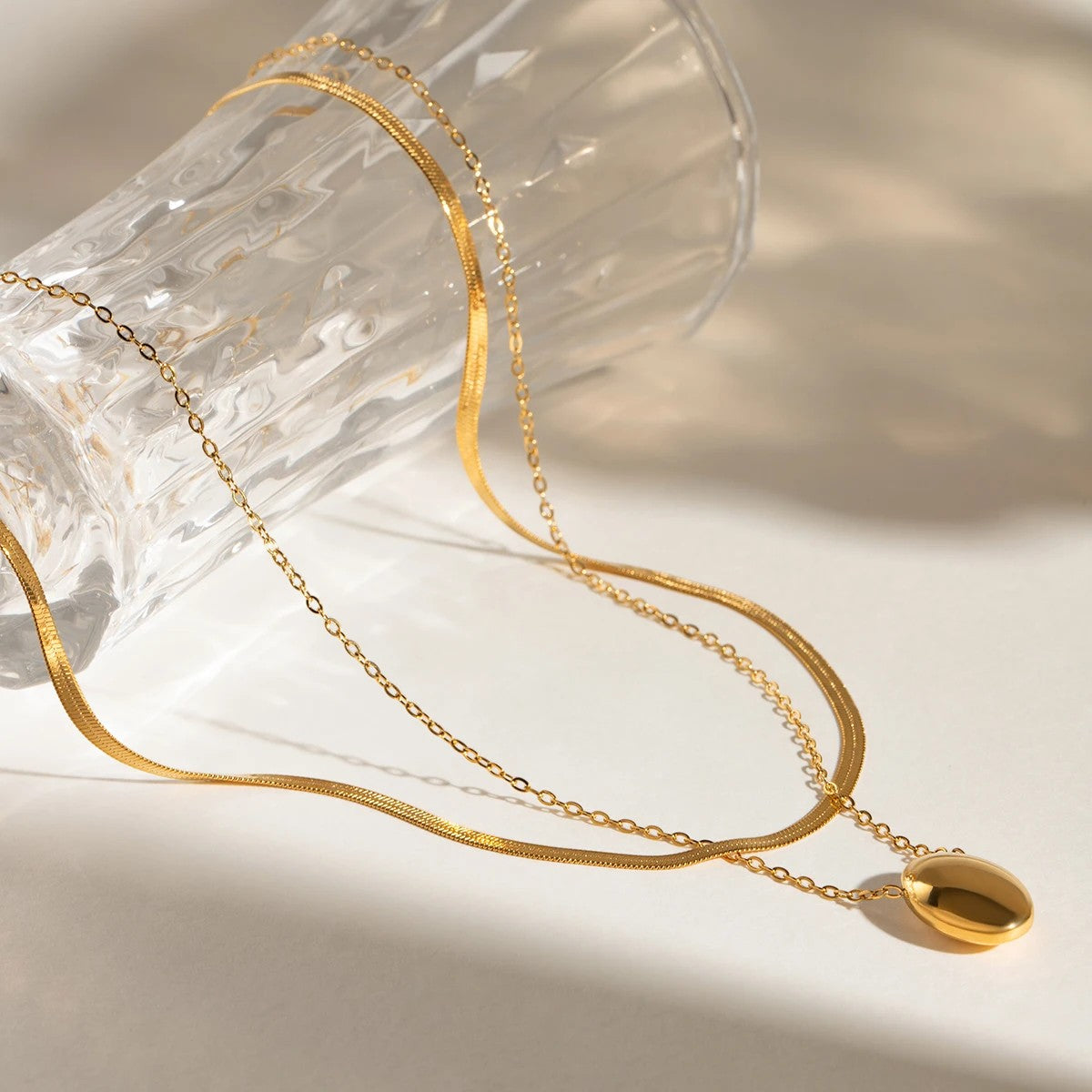 Women’s Layered Necklace with Oval Pendant and Two Different Chains