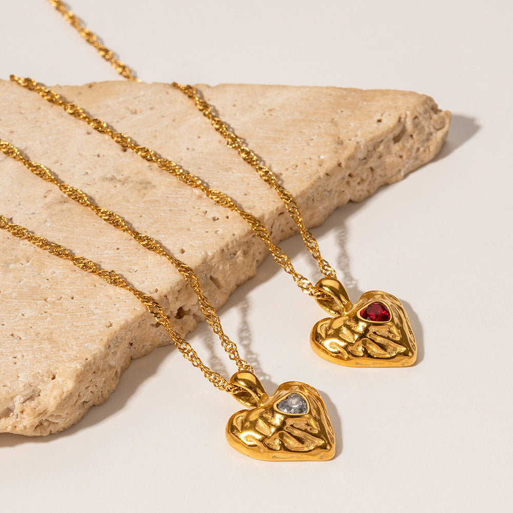 Women's Heart Pendant Necklace with Wavy Surface and Twisted Chain