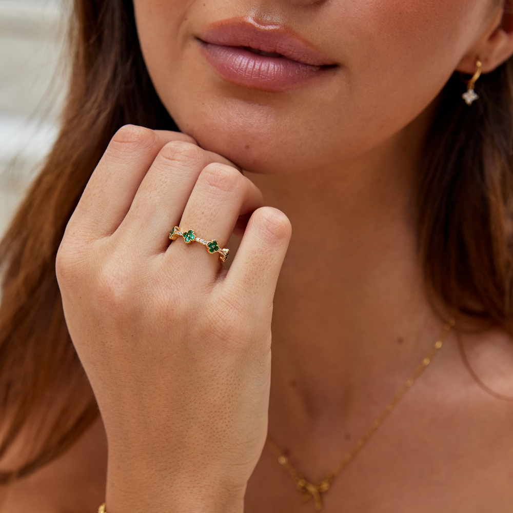Women’s Ring with Floral Stone Clusters and Round Stone Setting