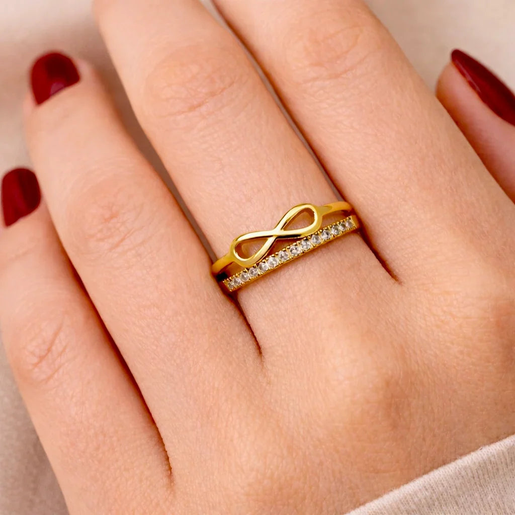 Women's ring with infinity symbol and faceted accents