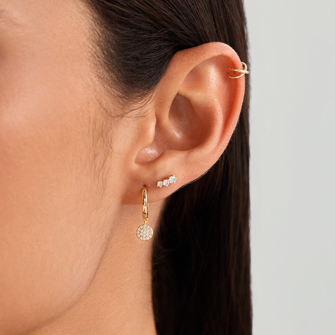 Women's Huggie Earrings with Round Pendant and Stone Embellishment