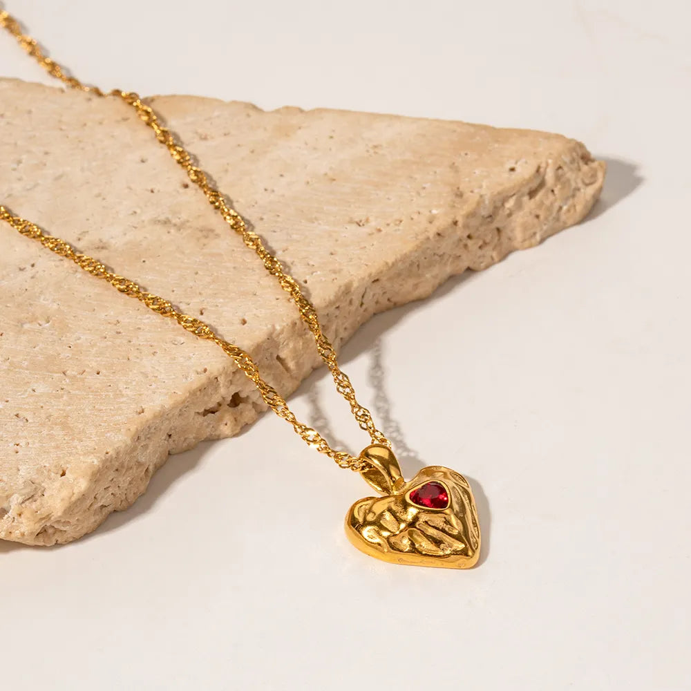 Women's Heart Pendant Necklace with Wavy Surface and Twisted Chain