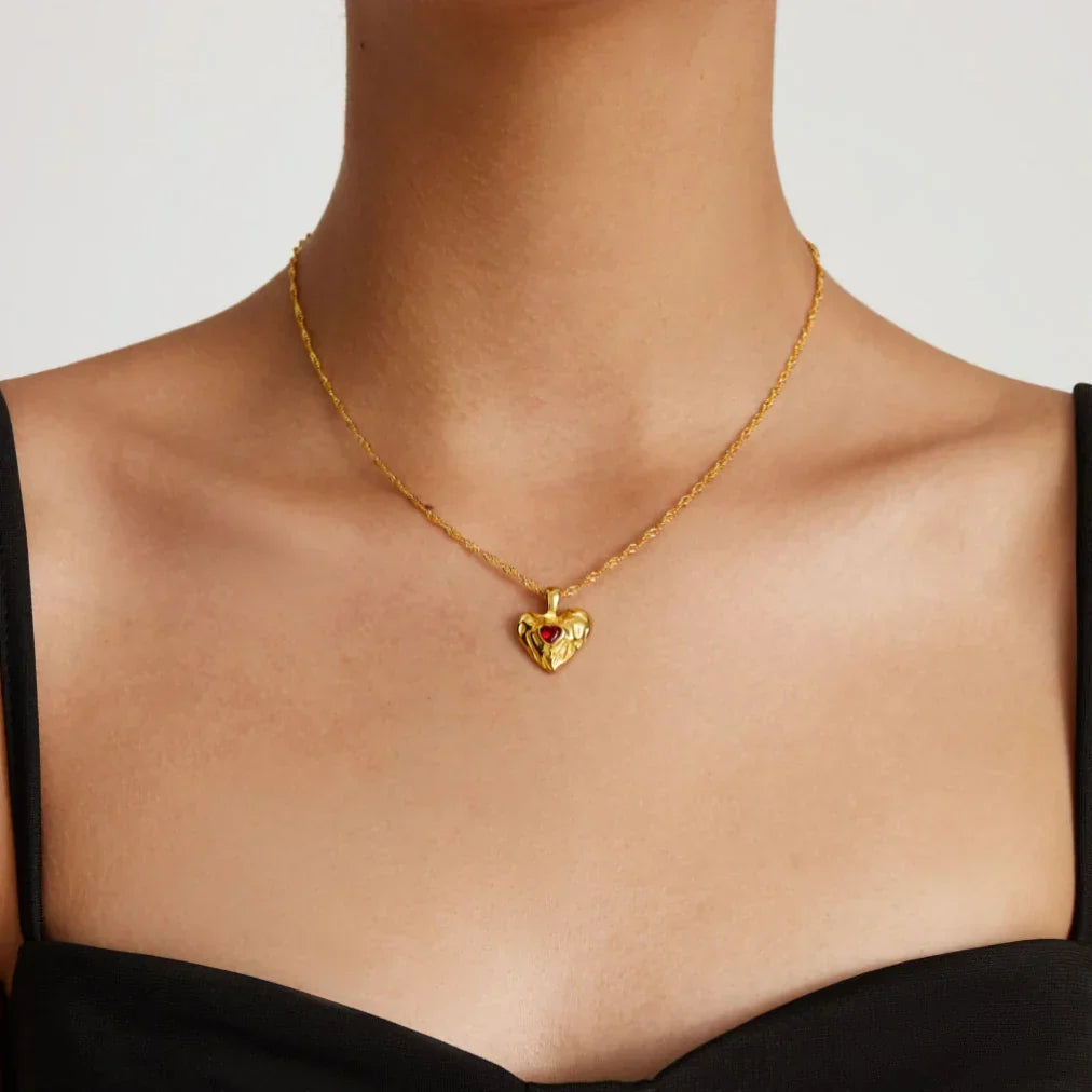 Women's Heart Pendant Necklace with Wavy Surface and Twisted Chain
