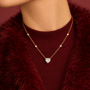 Women's Heart Pendant Necklace with Faceted Center Stone and Distributed Stone Accents
