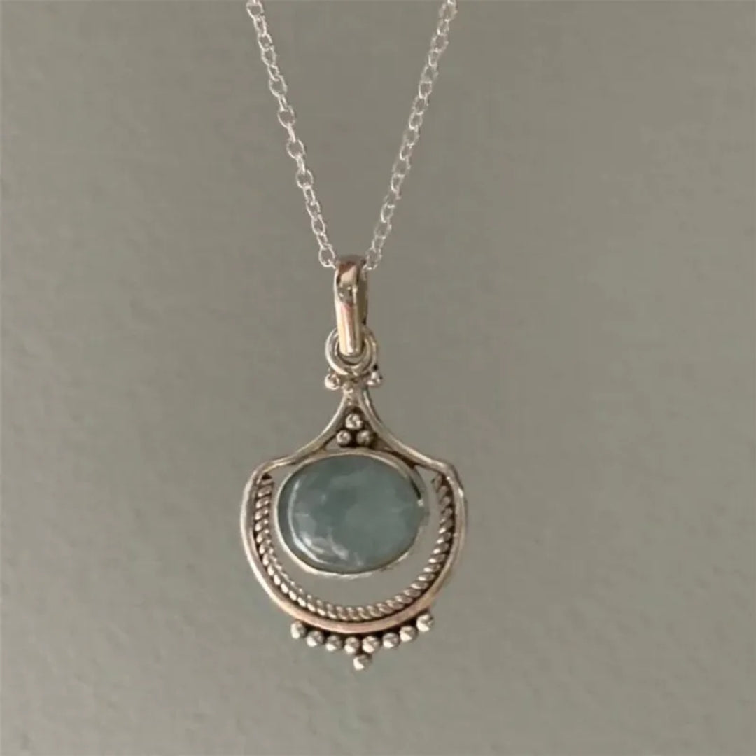 Women's Pendant Necklace with Round Centerpiece and Ornamental Setting