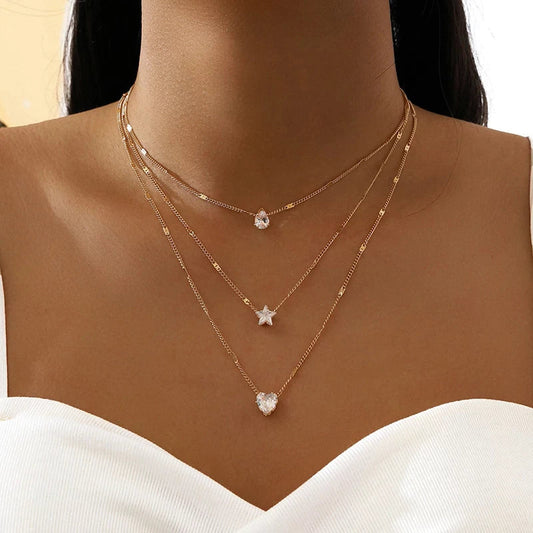 Sally – Gold chain with three zirconia pendants