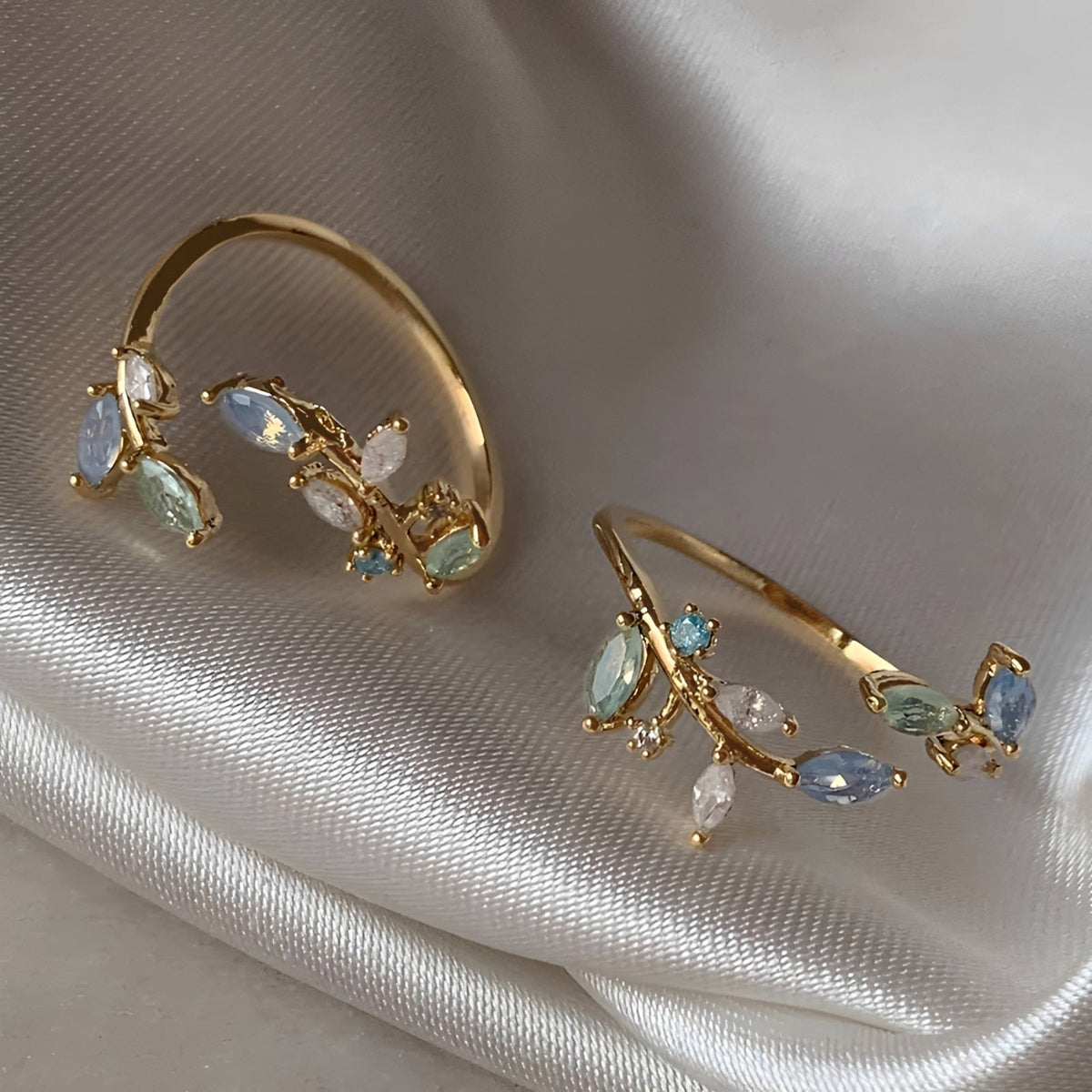 Women’s Open Ring with Leaf Motifs and Multiple Marquise Stones