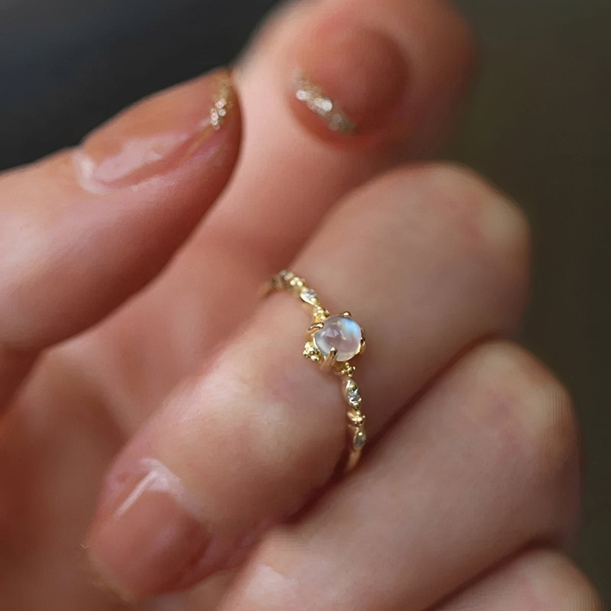 Women’s Ring with Round Moonstone Center Stone and Side Stone Accents