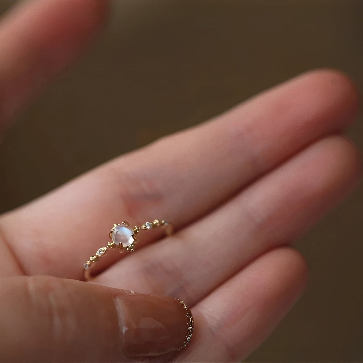 Women’s Ring with Round Moonstone Center Stone and Side Stone Accents