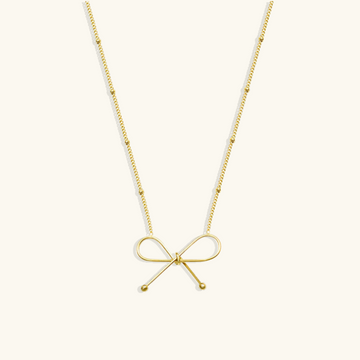 Women's Bow Necklace with Delicate Pendant and Extension Chain