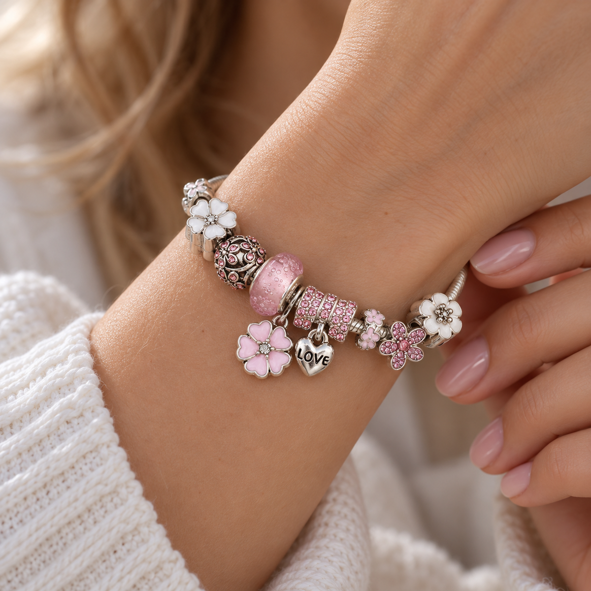 Women’s Charm Bracelet with Flower Motifs and Multiple Charm Details