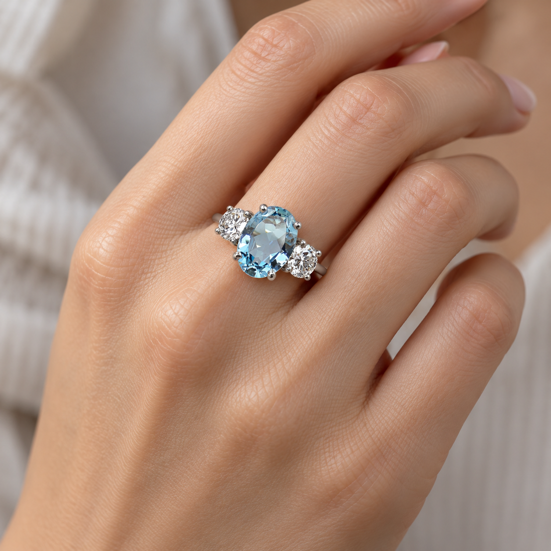 Women's Ring with Oval Center Stone and Side Stone Accents