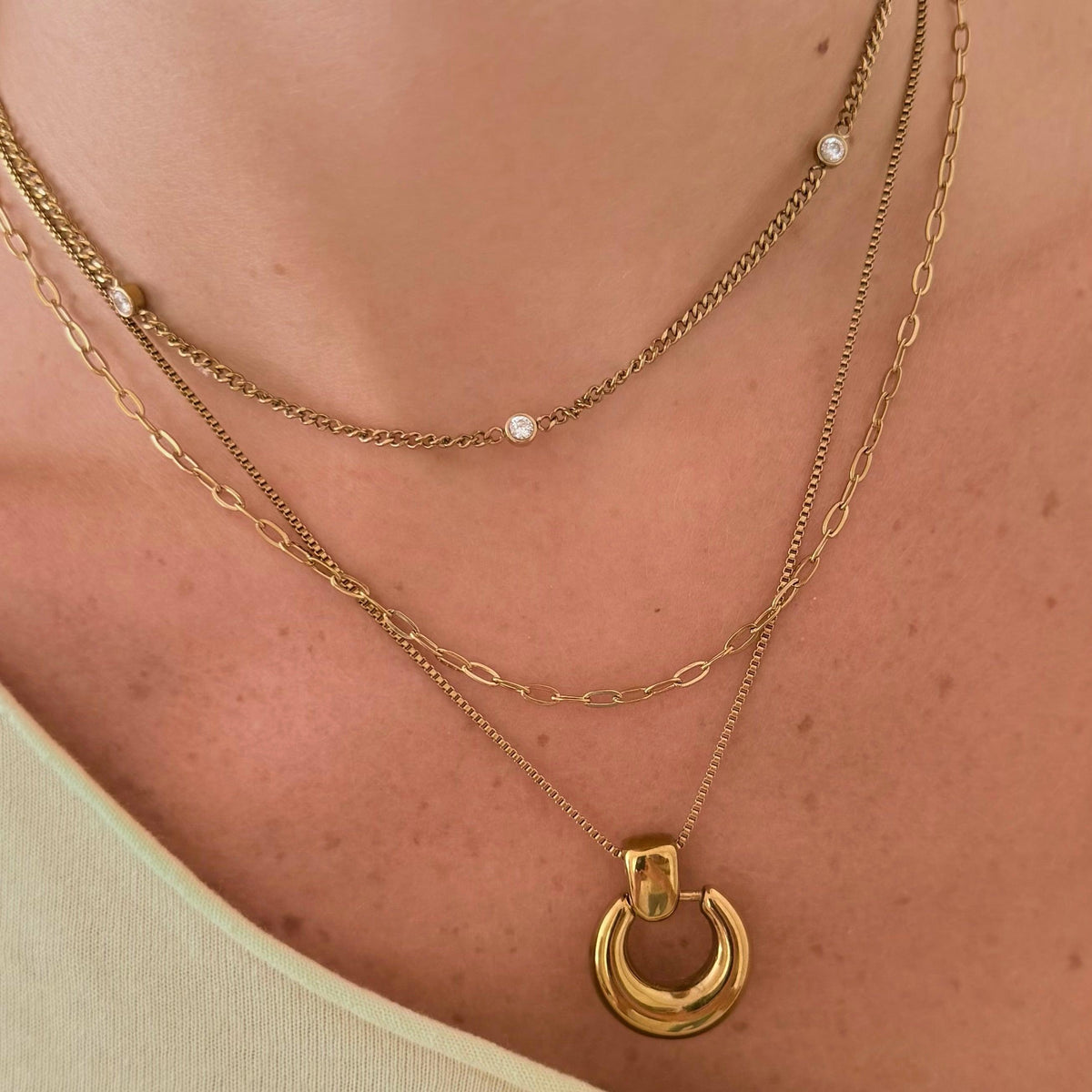Women's Pendant Necklace with Round Open Pendant and Sculptural Form