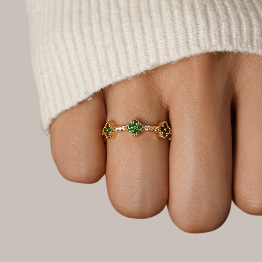 Women’s Ring with Floral Stone Clusters and Round Stone Setting