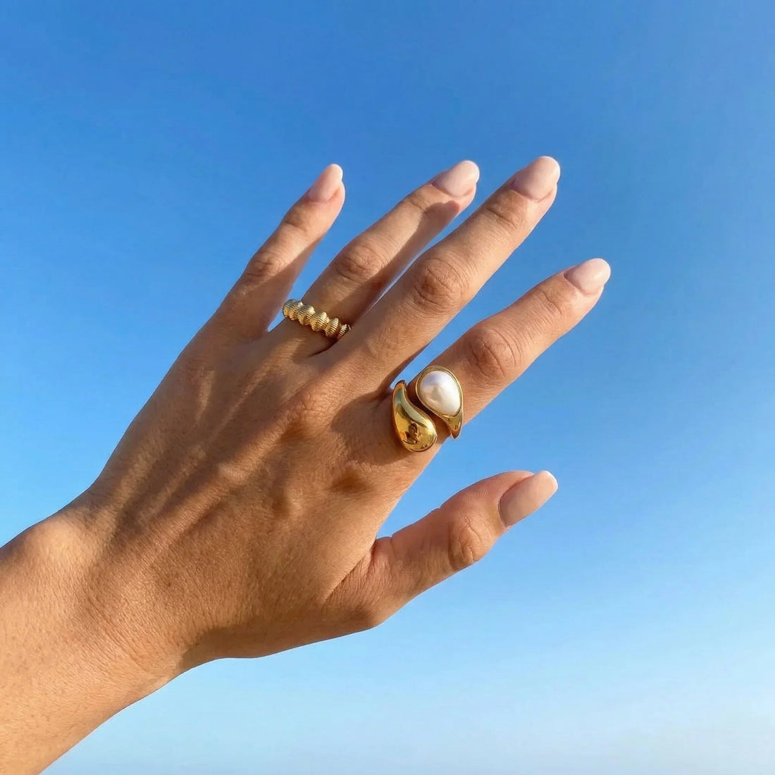 Women's Adjustable Statement Ring with Sculptural Design and Central Jewelry Element