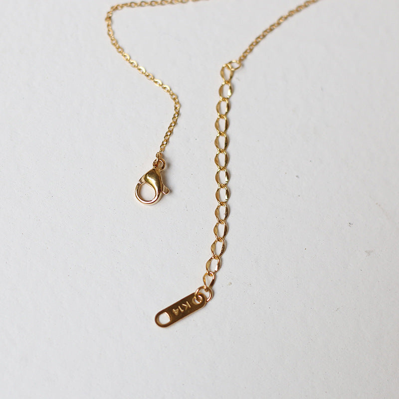 Nelly – Chain minimalist cross gold