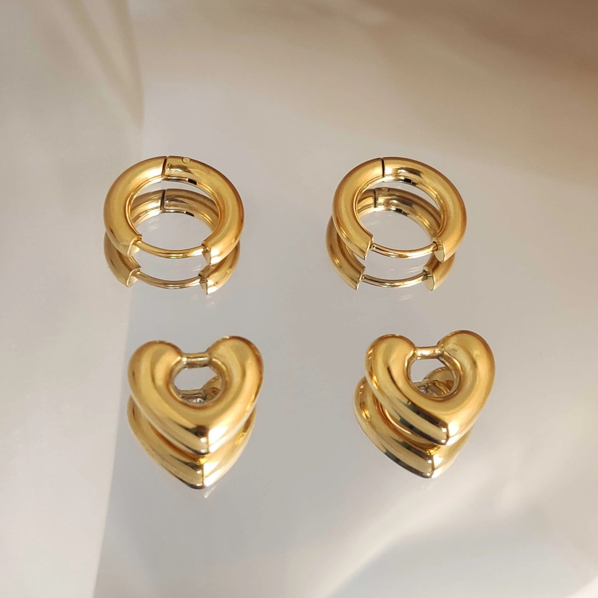 Women’s Huggie Earrings with Removable Heart Charms and Convertible Design