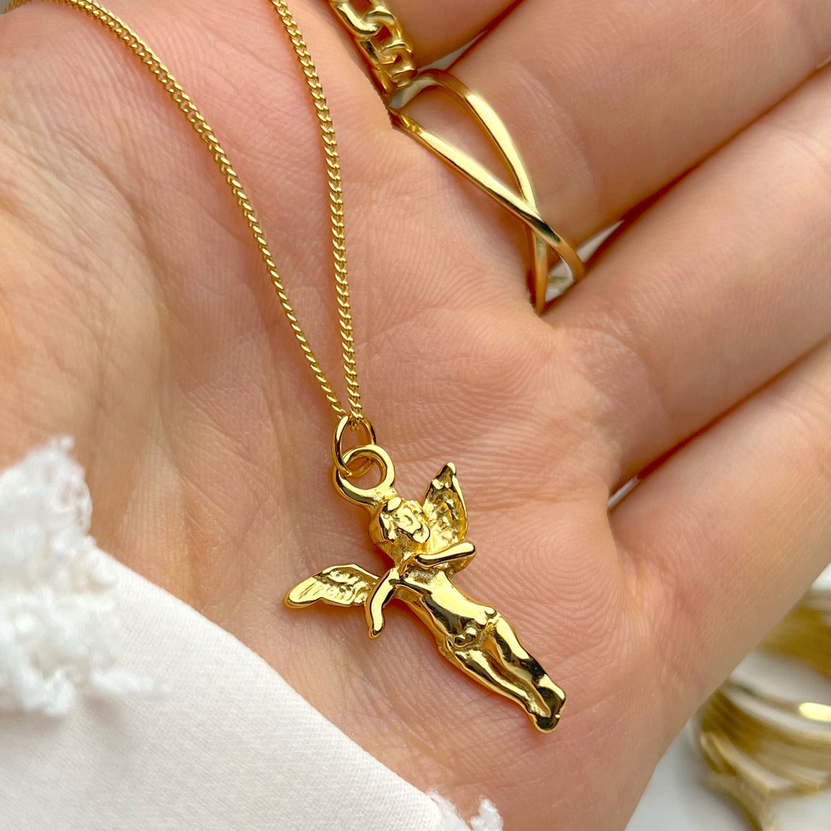 Women's Pendant Necklace with Angel Motif and Figurative Pendant