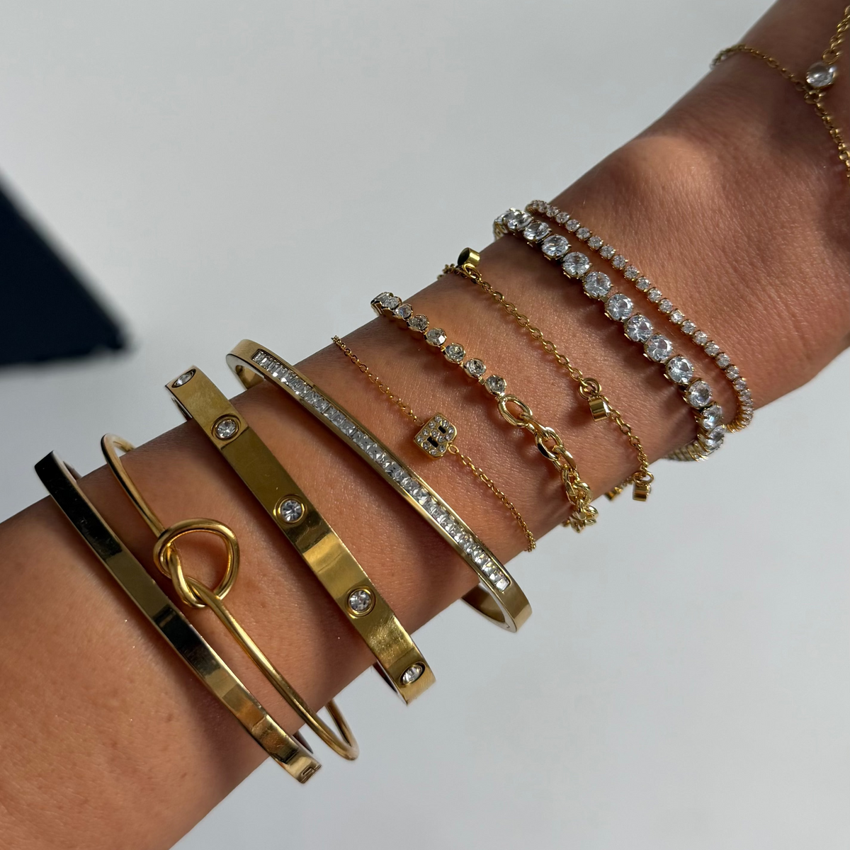 Women’s Open Bracelet with Knot Design and Ball Ends