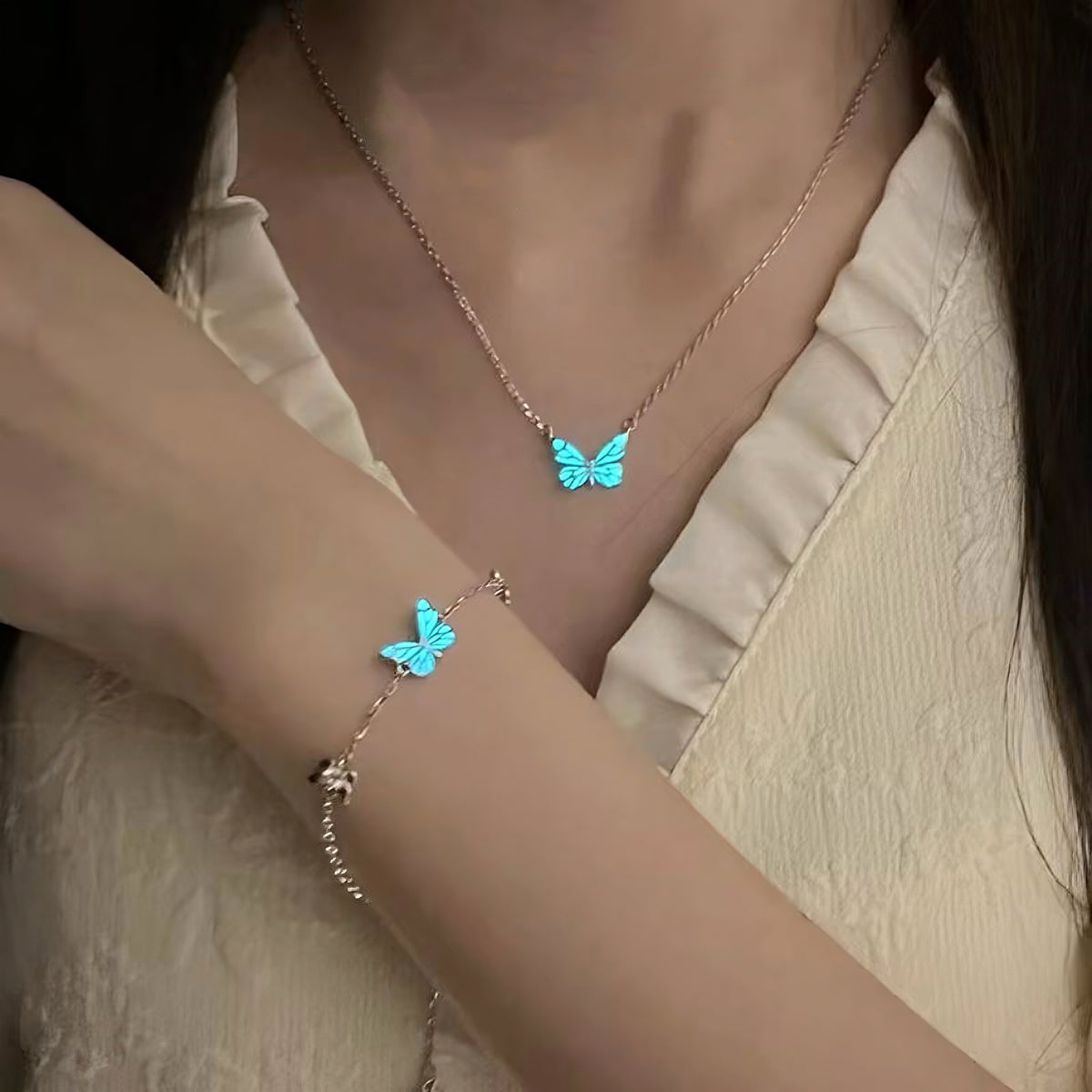 Women's Butterfly Bracelet with Glowing Pendant and Floral Details