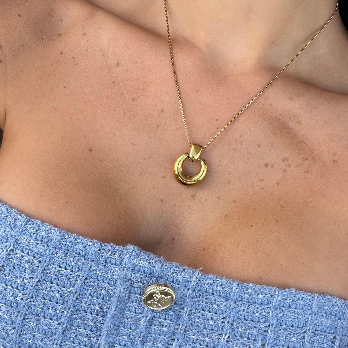Women's Pendant Necklace with Round Open Pendant and Sculptural Form