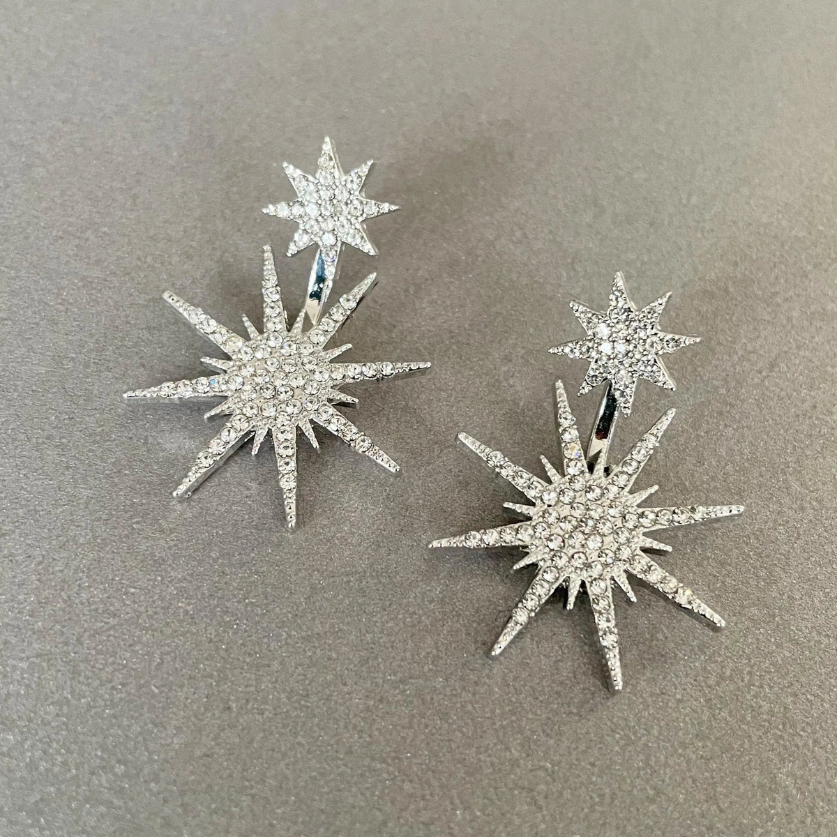 Women’s Ear Studs in Statement Style with Double Star Design and Continuous Stone Embellishment