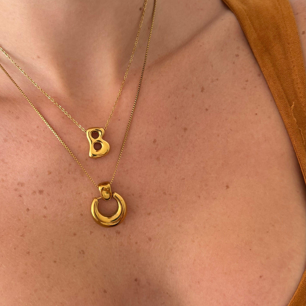 Women's Pendant Necklace with Round Open Pendant and Sculptural Form