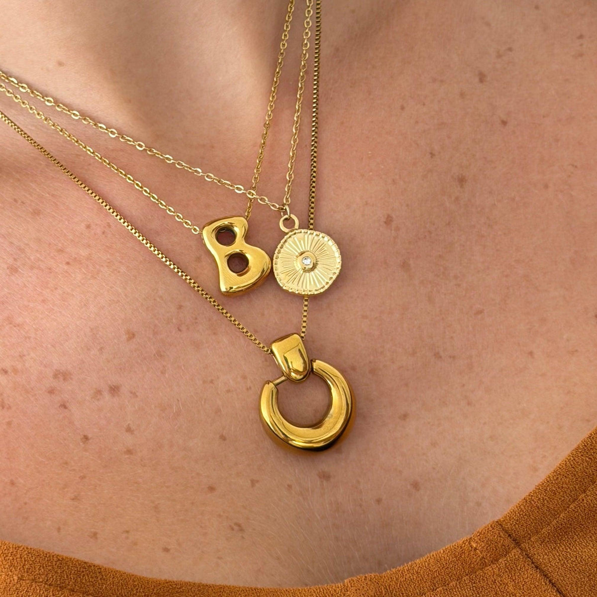Women's Pendant Necklace with Round Open Pendant and Sculptural Form