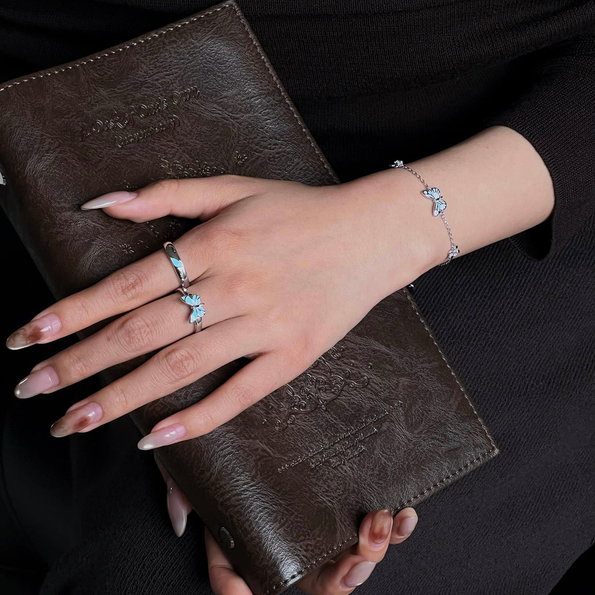 Women's Butterfly Bracelet with Glowing Pendant and Floral Details