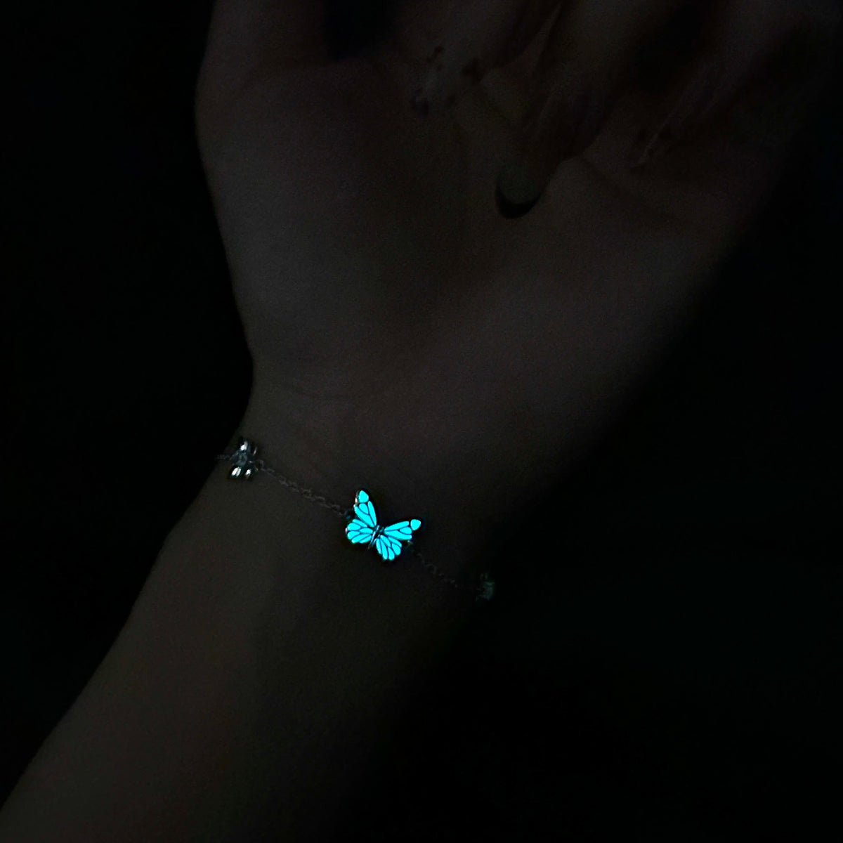 Women's Butterfly Bracelet with Glowing Pendant and Floral Details
