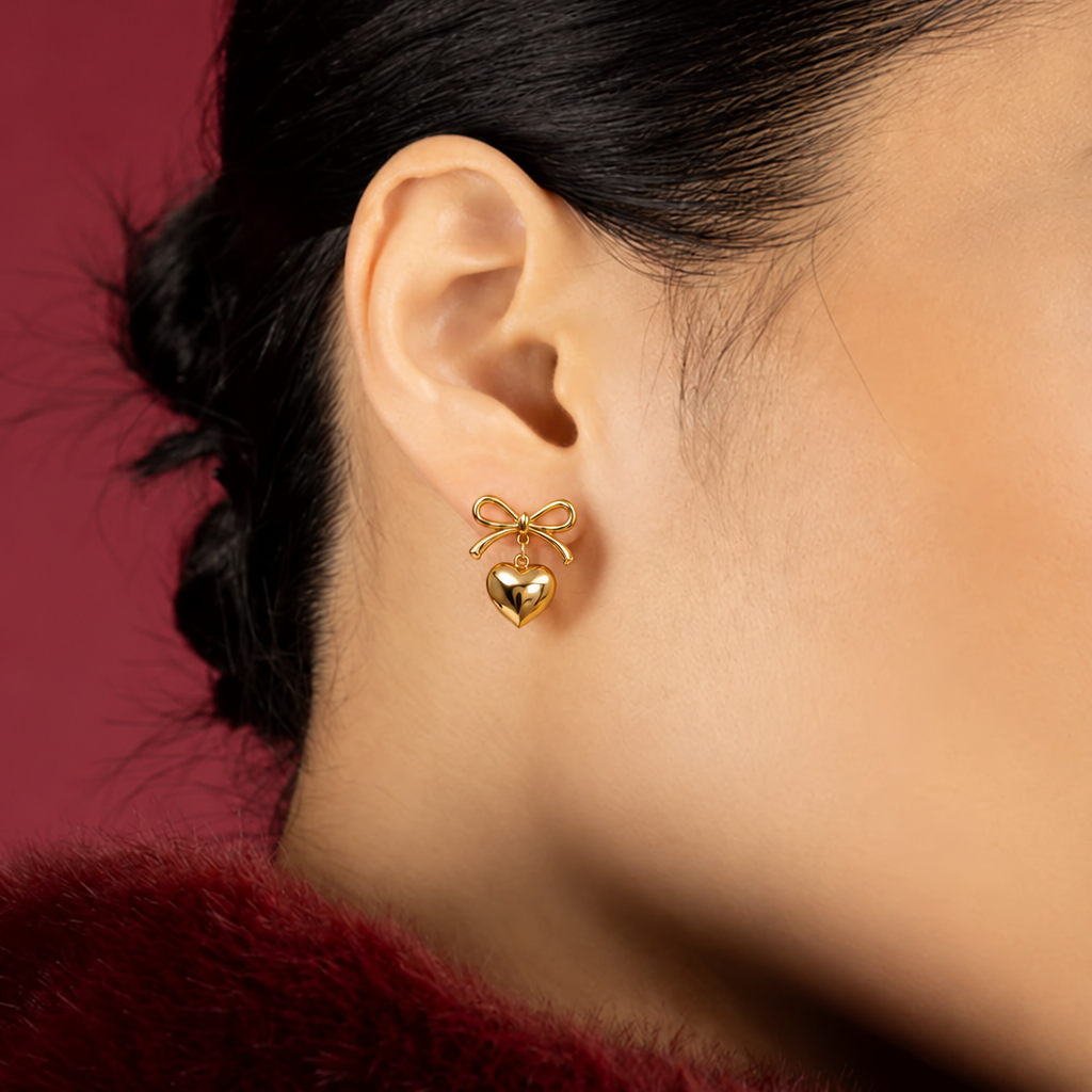 Women’s Ear Studs with Bow Motif and Hanging Heart Pendant