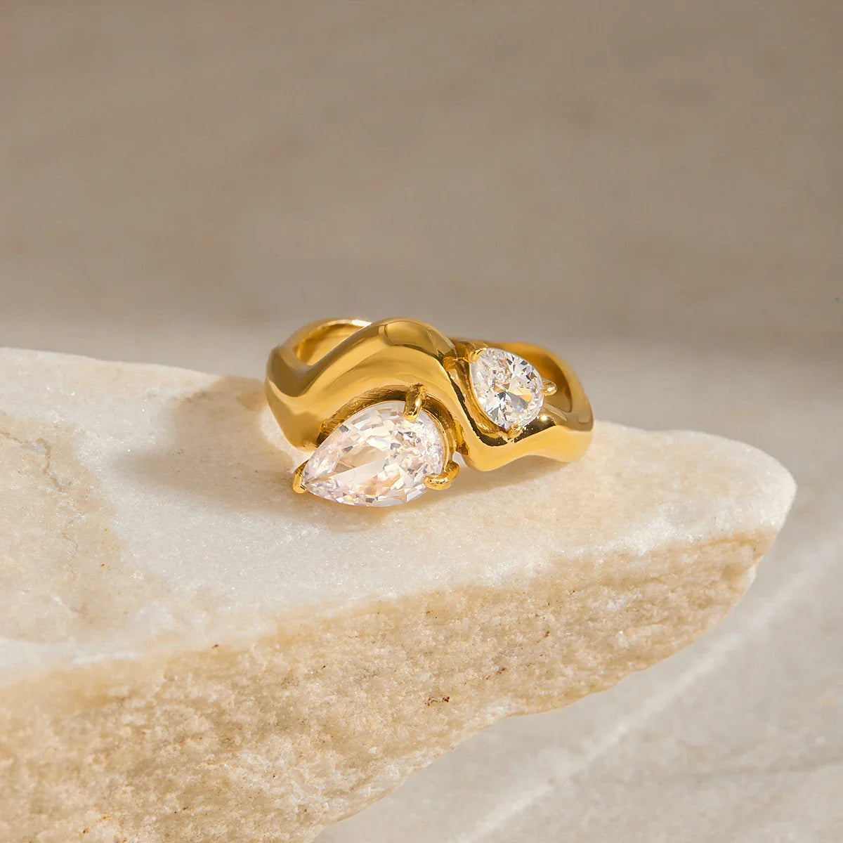 Women's Statement Ring with Two Teardrop-Shaped Stones and Curved Band
