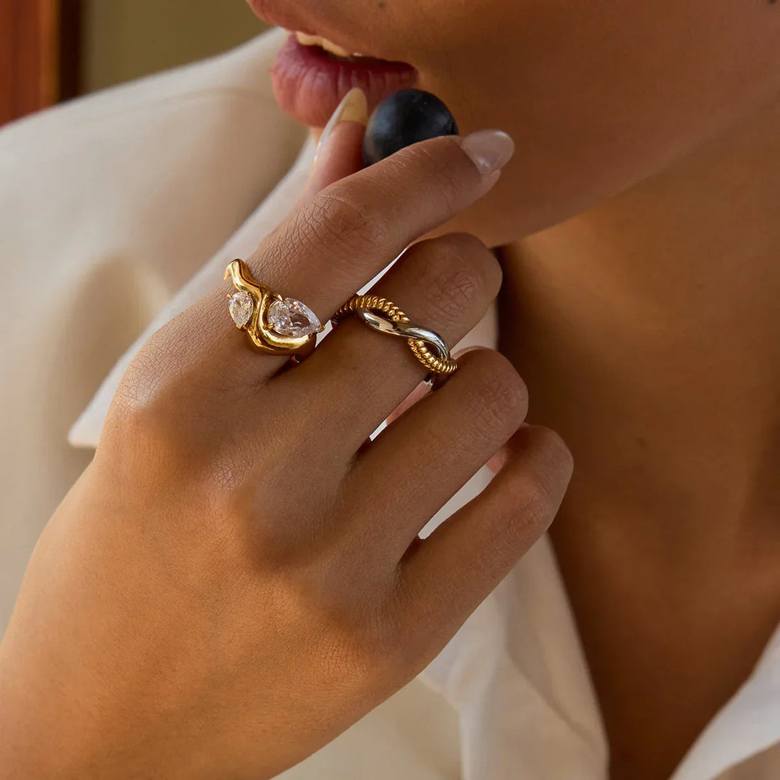 Women's Statement Ring with Two Teardrop-Shaped Stones and Curved Band
