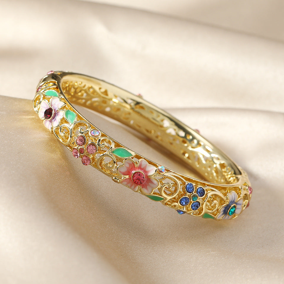 Women's Open Flower Bracelet with Enamel Details and Stone Accents